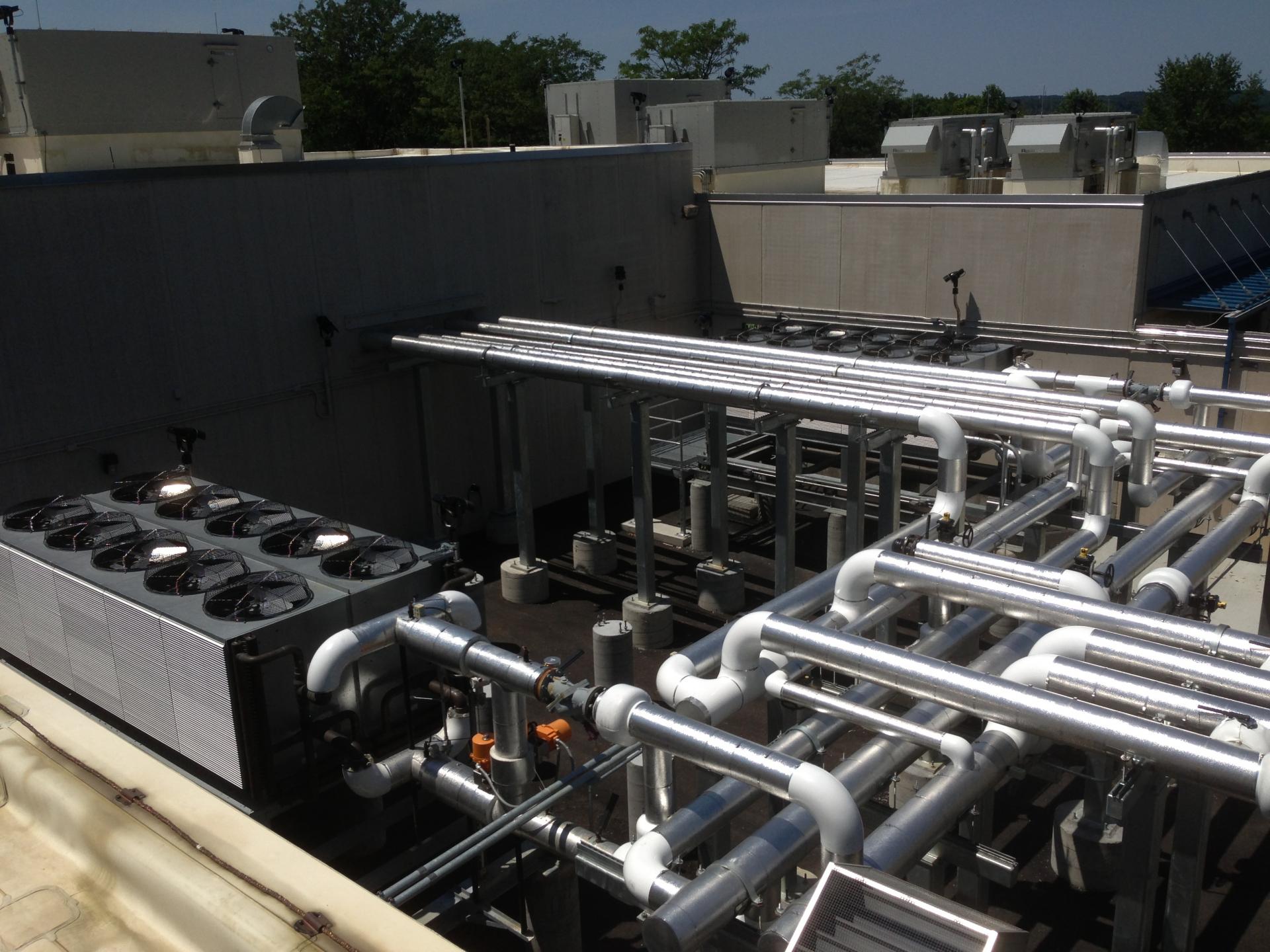 The secure mechanical and electrical equipment yard in neat, clean, and well organized. It was designed with space, valves, and futures to accommodate future planned expansion.