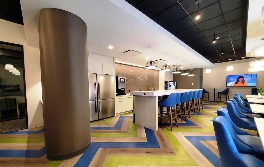 Pantry and breakroom with whimsical chevron flooring 
