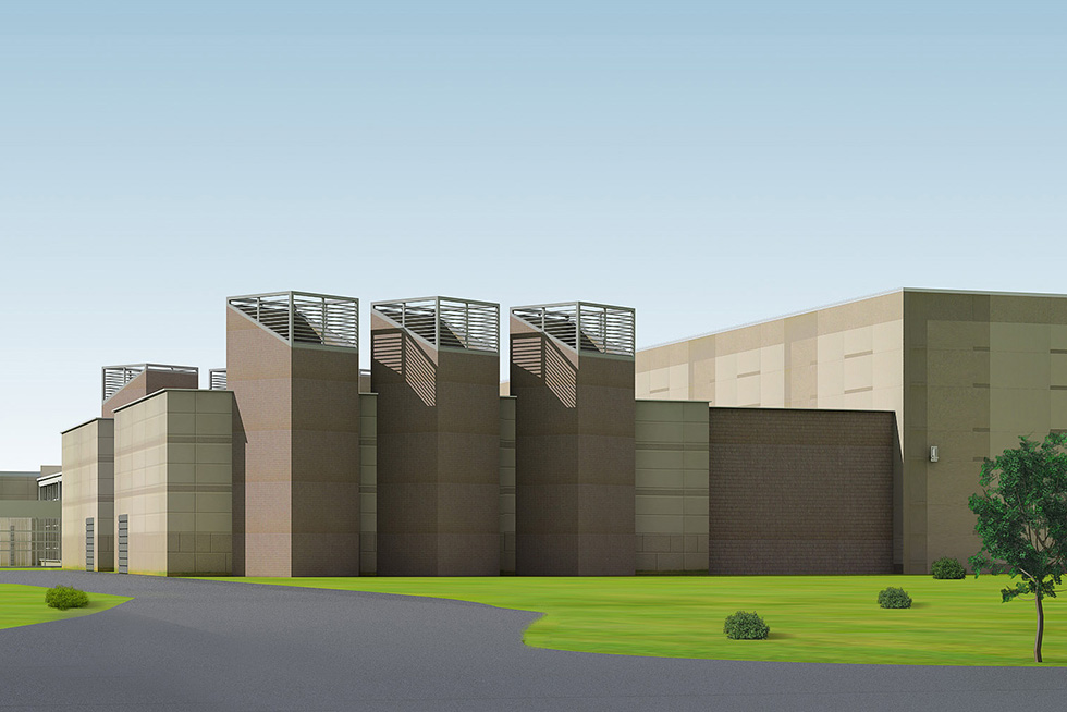 The intakes and exhausts are sculptural elements that tower above the mechanical and electrical yards.