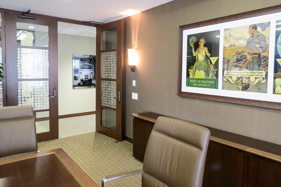 Artwork from the archives is displayed throughout the space. The pieces have been collected over their 150-year history 