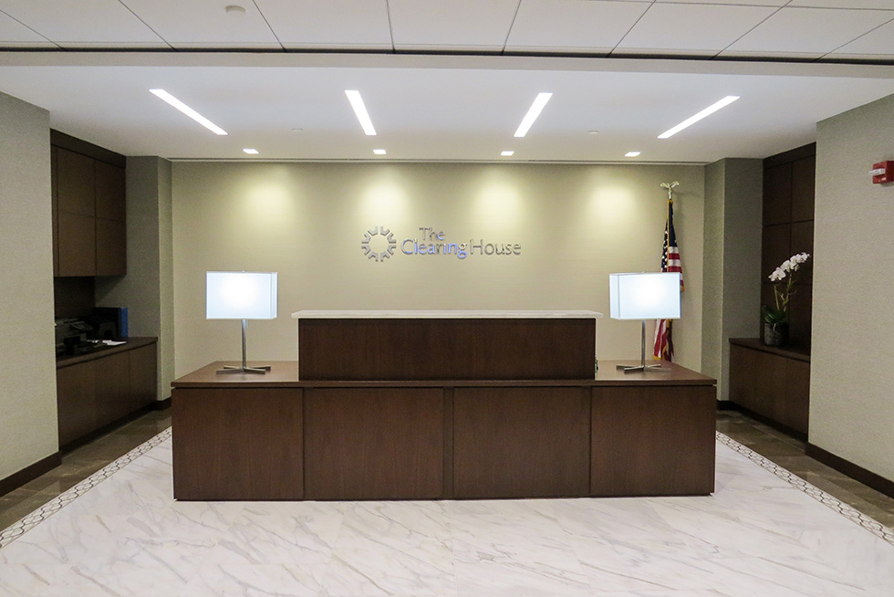 The clean crisp lines of the entry lobby set the tone for this century old financial institution.