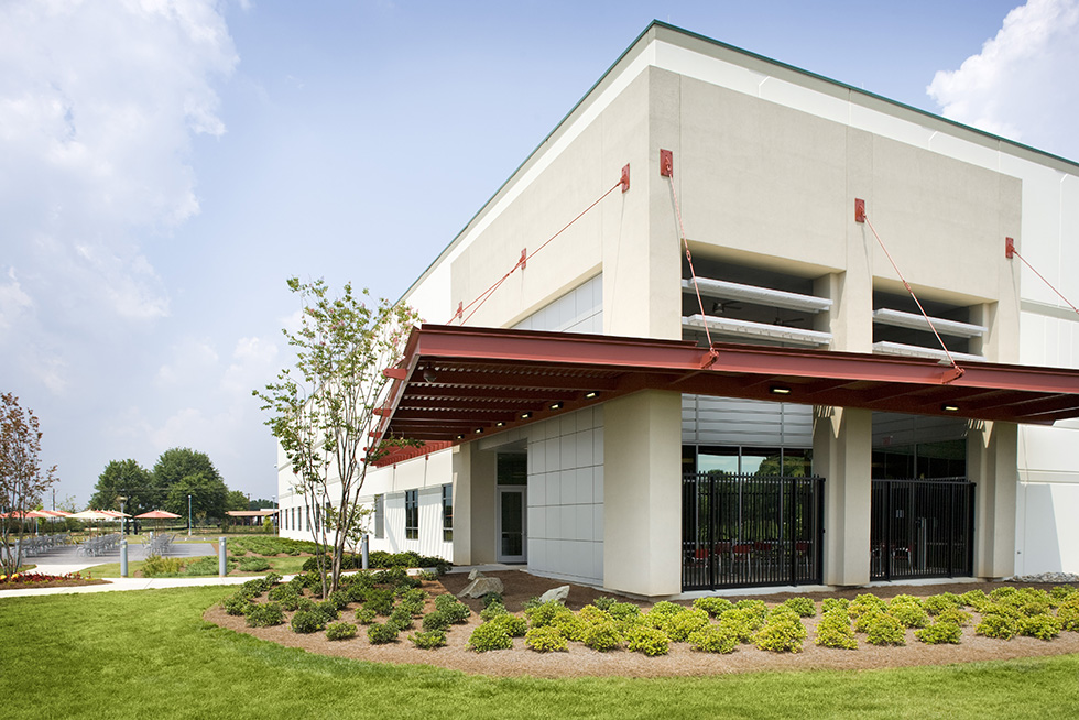 Entry canopy shades the lobby windows reducing solar gain