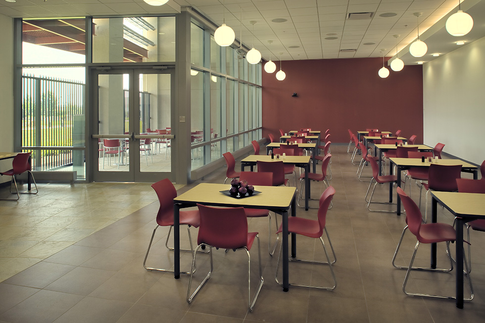 The pantry and break room feature access to a secure outdoor seating area.