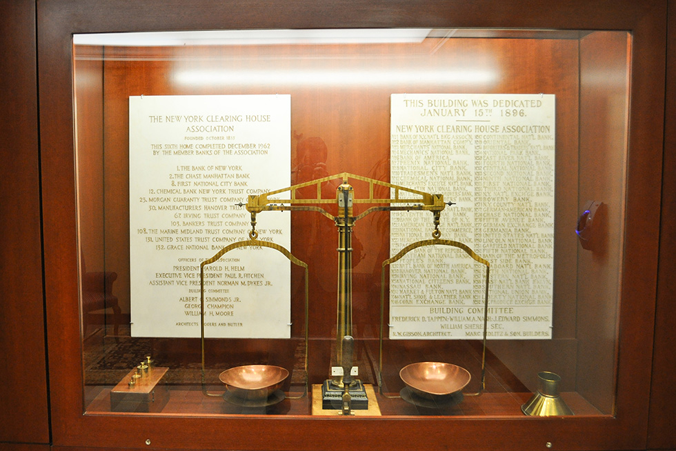 A pair of white stone tablets, rescued from the original building (circa 1896) are a testament to The Clearing House 